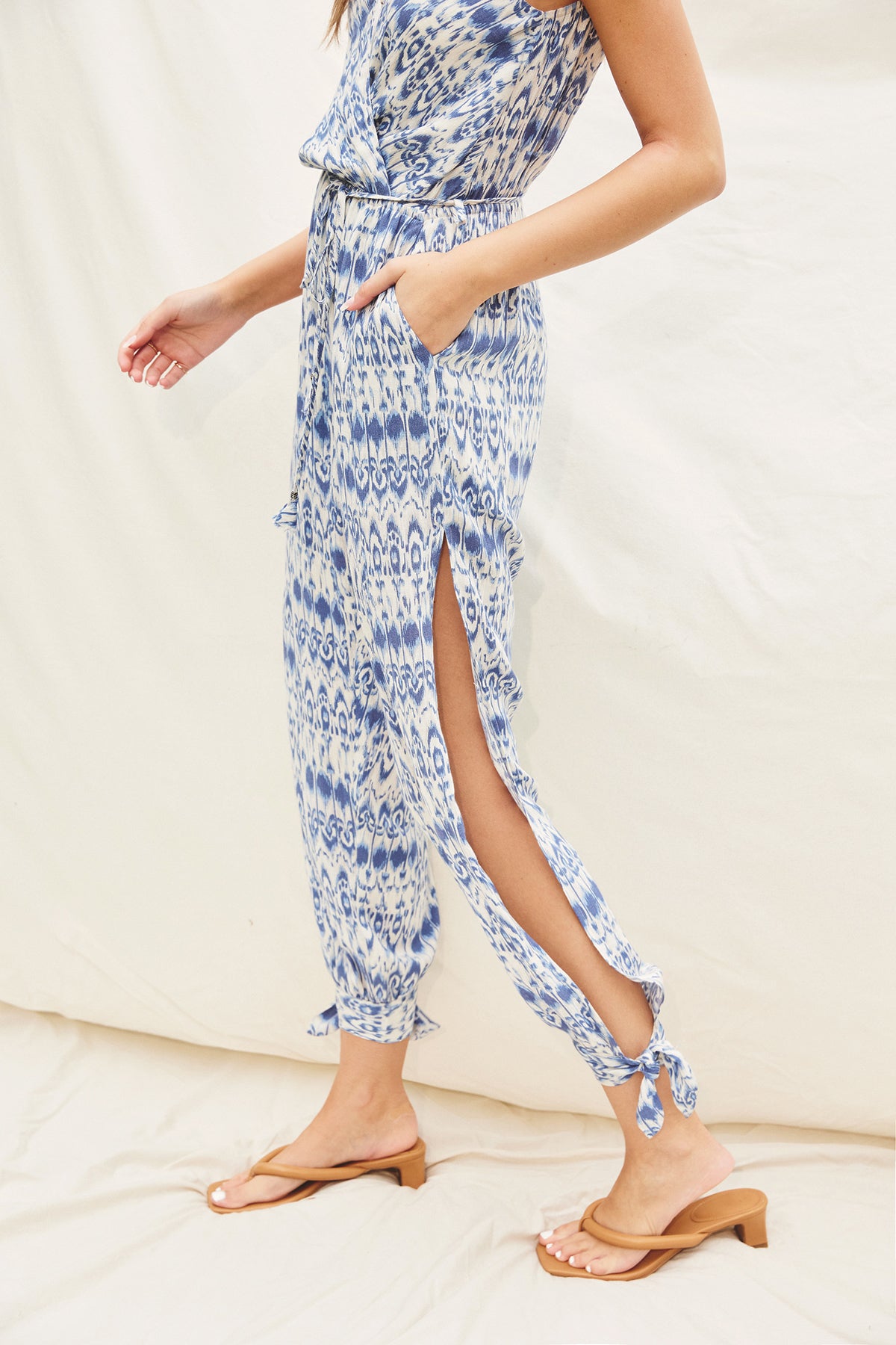 Oceans Away Surplice Tie Ankle Jumpsuit - Denim