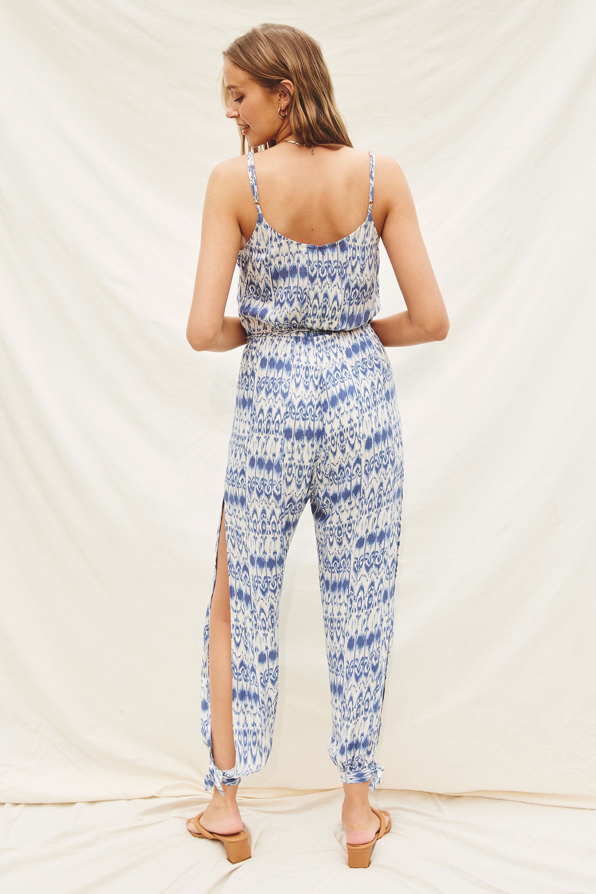 Oceans Away Surplice Tie Ankle Jumpsuit - Denim